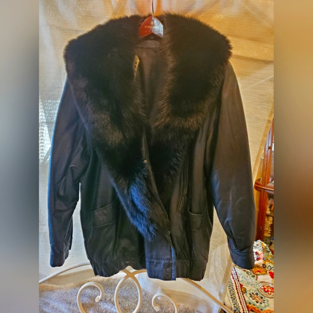 Leather bomber jacket with detachable black fox collar